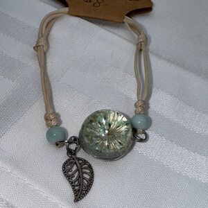 Bracelet adjustable blue green flower bead with a leaf charm handcrafted it new
